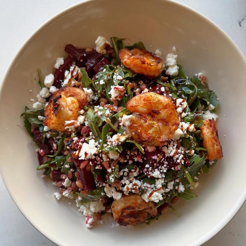 Fora Cafe's shrimp and beet salad with arugula, feta, and a balsamic glaze.